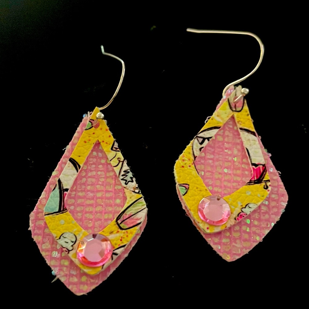 Camper and pink faux leather with pink jewel at tips.